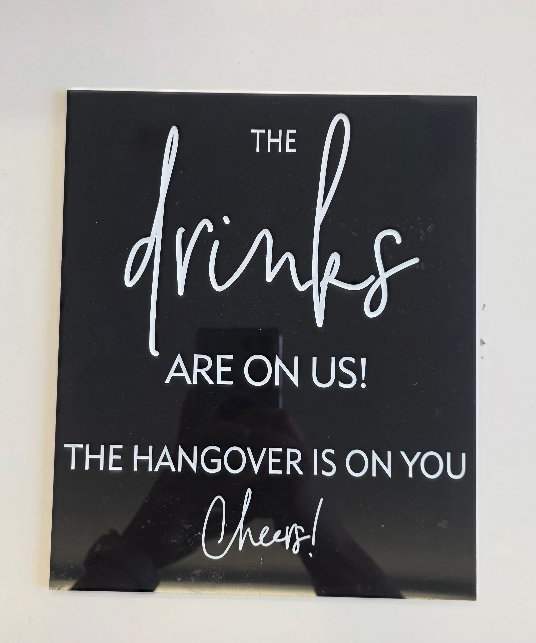 black white / Drinks on us sign